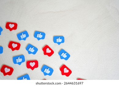 Likes and heart figures from social networks. Trends, fashion and everyone's attention. Attention economy, influencer culture, and digital popularity. Modern communication, brand visibility,