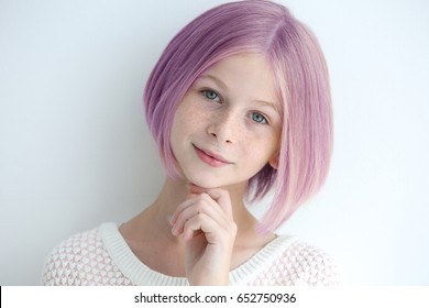 Lilac Color For Trendy Hairstyle Ideas. Girl With Dyed Hair On Light Background