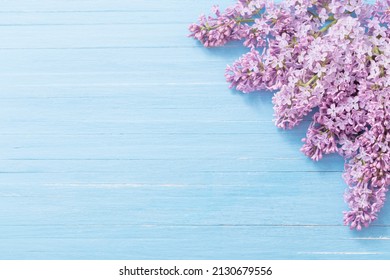 Lilac On Blue Wooden Background