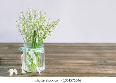 Lilies Of Valley On Rustic Wooden Background. Gentle White Flowers Bouquet. Romantic Spring Season Concept. Lily Of The Valley Day In France, 1 May Holiday Concept. Copy Space