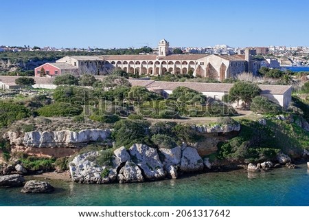 L'Illa del Rei Hospital Island in the middle of the main navigable entry channel to Mahon in Menorca in the Mediterranean Sea