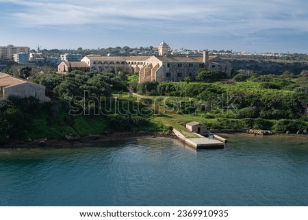 L'Illa del Rei hospital island in the middle of the main navigable entry channel to Mahon in Menorca in the Mediterranean sea