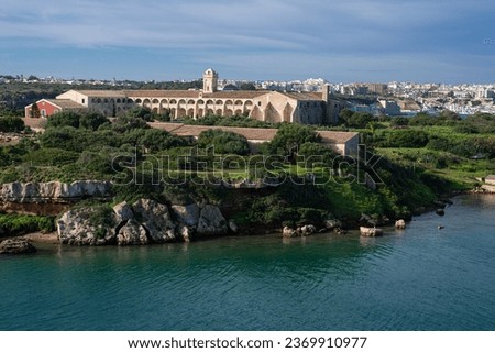 L'Illa del Rei hospital island in the middle of the main navigable entry channel to Mahon in Menorca in the Mediterranean sea