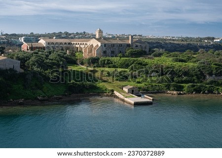 L'Illa del Rei hospital island in the middle of the main navigable entry channel to Mahon in Menorca in the Mediterranean sea