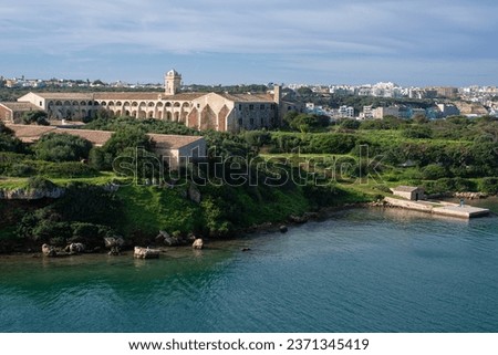 L'Illa del Rei hospital island in the middle of the main navigable entry channel to Mahon in Menorca in the Mediterranean sea