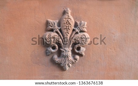 lily symbol of Florence Tuscany printed on a old terracotta tile