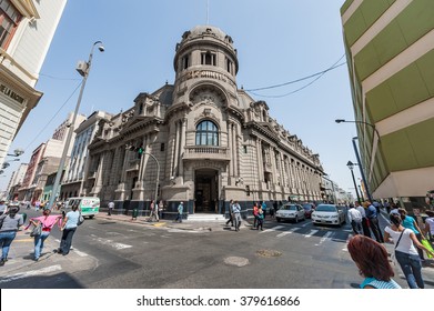 LIMA, PERU - APRIL 15, 2013: Business Street In Lima And Newspaper Office Building In Background