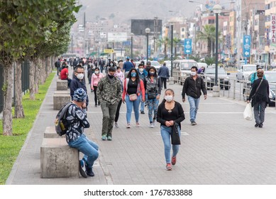 Lima, Peru - July 01, 2020: People Walking In The Street Of Lima Using Masks. 