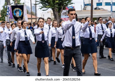 Limassol, Cyprus, October 28th, 2021: High school students in uniform marching along the Archbishop Makarios III Avenue during the Ohi Day parade