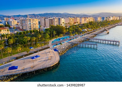 Limassol. Cyprus. The seafront of Limassol Molos day panorama. Beach promenade Limassol from the height. Mediterranean sea coastline. The beaches of Cyprus. Vacation in Cyprus seaside.