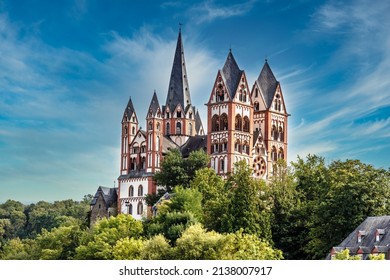 The Limburg Cathedral, also called Georgsdom after its patron saint St. Georg, has been the cathedral church of the Limburg diocese since 1827 and towers above the old town of Limburg an der Lahn. - Shutterstock ID 2138007917