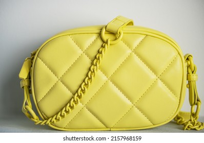 Lime Cross Body Bag. Ladies Bright-colored Handbag On Gray Background. Yellow Woman Bag.