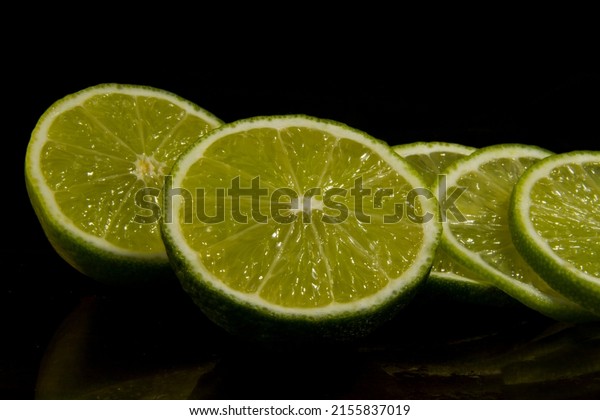 Lime divided in half. lime\
slices