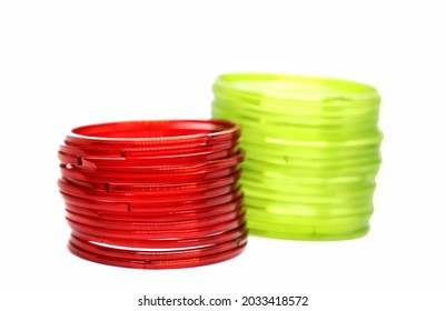 Lime Green And Red Glass Bangles Isolated On White Background