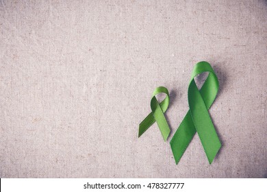 Lime Green Ribbons ,Lyme disease, Mental health awareness - Shutterstock ID 478327777