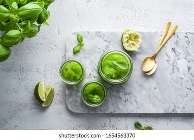 Lime, Mint And Basil Green Slushy On White Background.