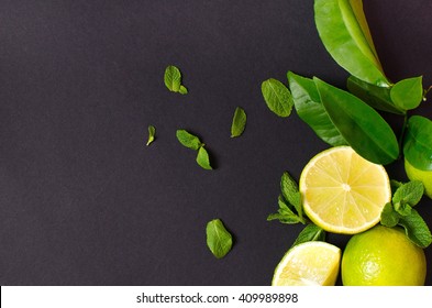 Lime And Mint On Black Background From Above