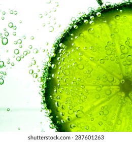 Lime Slice In Clear Fizzy Water Bubble