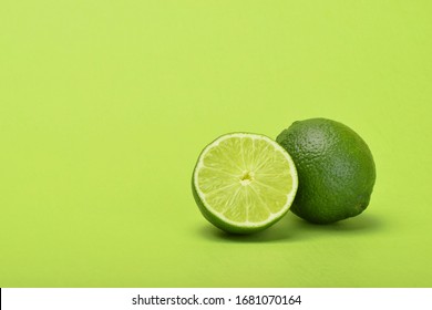 Lime With Slice Green Background