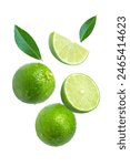 Lime with slice and green leaf isolated on white background.