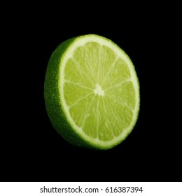 Lime Slice On Black Background Isolated