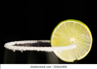 Lime Wheel And Salt On The Rim Of A Glass