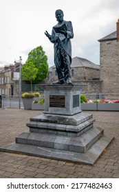 Limerick, Ireland - May 10 2022; Michael Hogan (poet) Statue In King John's Castle Plaza