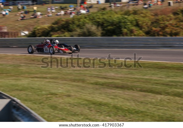 Limerock Park, CT - September 4, 2015: A few cars\
finish the race neck and\
neck.