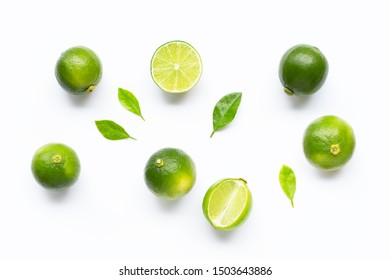 Limes with leaves isolated on white background. - Shutterstock ID 1503643886
