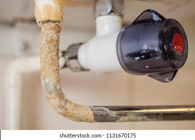 Limescale. Hard Water Plumbing Damage On A Boiler Pipe. Calcium Carbonate Build Up On A Badly Maintained Hot Water System.