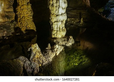 Limestone Mineral Pool Formed At The Bottom Of A Stalagmite.  Pretty Green Coloured At The Bottom Of Carlsbad Caverns In New Mexico. 