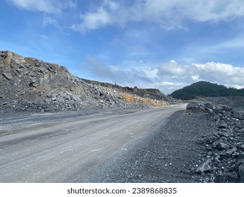 Limestone mining on high mountain peaks.