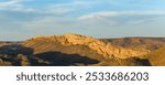 A limestone ridge cuts through the Wyoming high desert landscape.