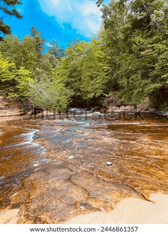 Limestone river floor on a beautiful blue summer day