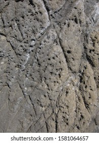 Limestone rocks with cracks near Mediterranean sea