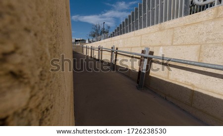 Limestone walk way with metal handrains