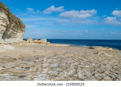 Limestone wave  cut platform along the coast Delimara  Malta  showing evidence coastal weathering   erosion   cliff recession  Maltese Island
