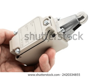 Limit switch sensor of the machine. limit switch for mechanical movement and actuators limits. isolated on white background of limit switch, control device, electrical equipment in control system.