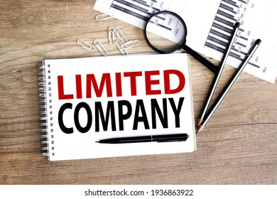 Limited company. text on white paper on wood background - Shutterstock ID 1936863922