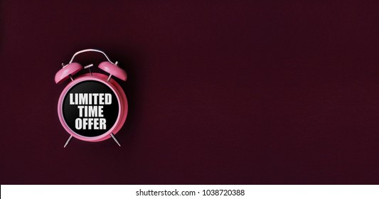 Limited time offer. Red alarm clock on Darck red background. Dark red web banner for black friday, sale, discount poster, store promotion. - Powered by Shutterstock