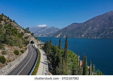 Limone sul Garda - bicycle path hanging on Garda Lake view by Drone.
Cycling on Garda on Holiday, the best place to run.