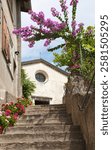 Limone sul Garda - The stairs among the flowers to church San Rocco on the Lago di Garda lake.