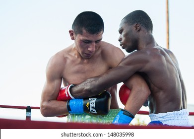 LINCOLN, CA July 26: ESPN's Friday Night Fights Featuring Burgos (yellow Trunks) Vs Amidu At Thunder Valley Casino Resort In Lincoln, California On July 26, 2013