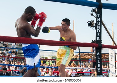 LINCOLN, CA ? July 26: ESPN's Friday Night Fights Featuring Burgos (yellow Trunks) Vs Amidu At Thunder Valley Casino Resort In Lincoln, California On July 26, 2013