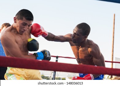 LINCOLN, CA ? July 26: ESPN's Friday Night Fights Featuring Burgos (yellow Trunks) Vs Amidu At Thunder Valley Casino Resort In Lincoln, California On July 26, 2013