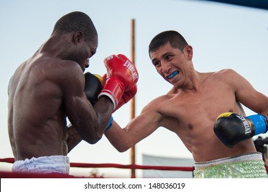 LINCOLN, CA July 26: ESPN's Friday Night Fights Featuring Burgos (yellow Trunks) Vs Amidu At Thunder Valley Casino Resort In Lincoln, California On July 26, 2013