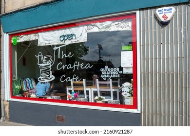 Lincoln, Lincolnshire, England - May 17, 2022. The Craftea Cafe Exterior Window Display Close Up.