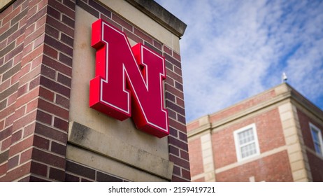 Lincoln, NE - May 22, 2022: Nebraska Cornhuskers University Logo On Campus Building