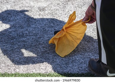 Lincoln, Nebraska, USA - A Football Official Picks Up His Yellow Flag After Calling A Penalty In The Annual University Of Nebraska Red-White Spring Game At Memorial Stadium In Lincoln.