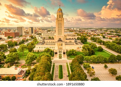 Lincoln skyline and Nebraska State Capitol. The Nebraska State Capitol is the seat of government for the U.S. state of Nebraska and is located in downtown Lincoln.